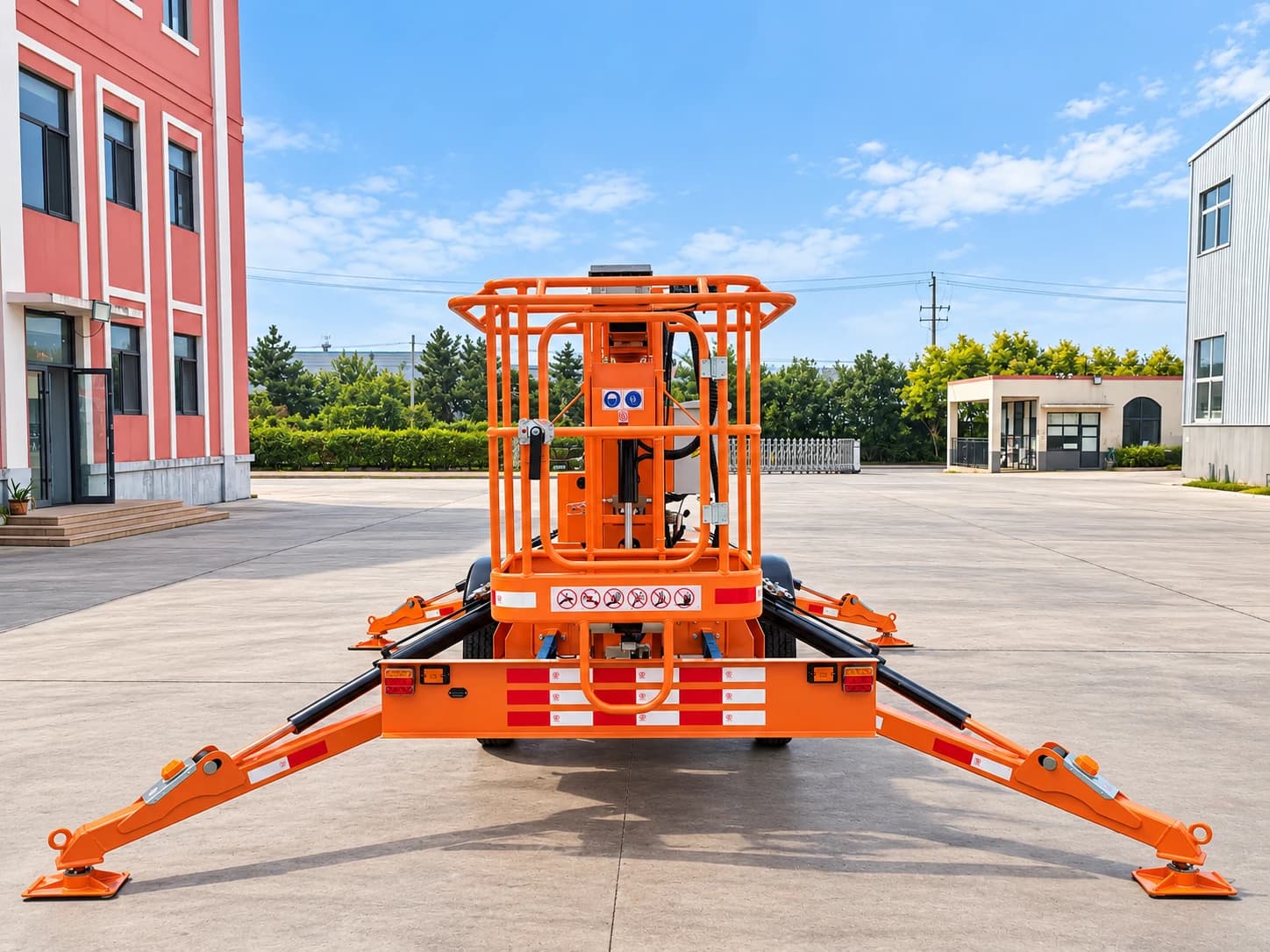 MCM TCP14 Cherry Picker / Trailer-Mounted Towable Boom Lift, rear view of the platform basket with outriggers spread