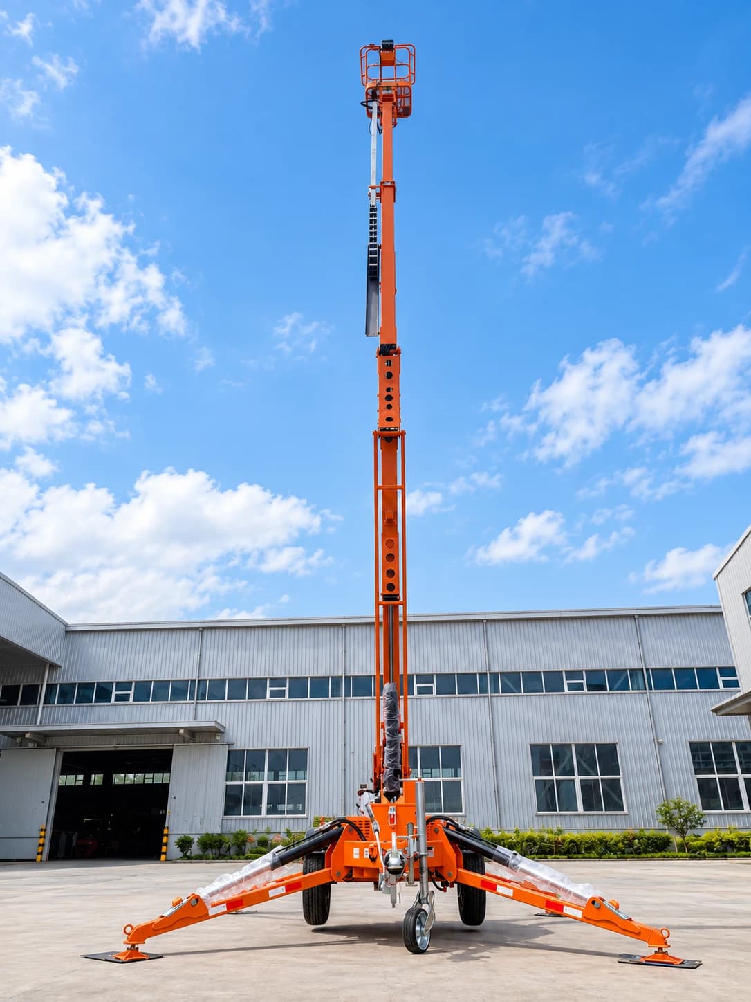 MCM TCP14 Cherry Picker / Trailer-Mounted Towable Boom Lift, with the boom fully raised, front view