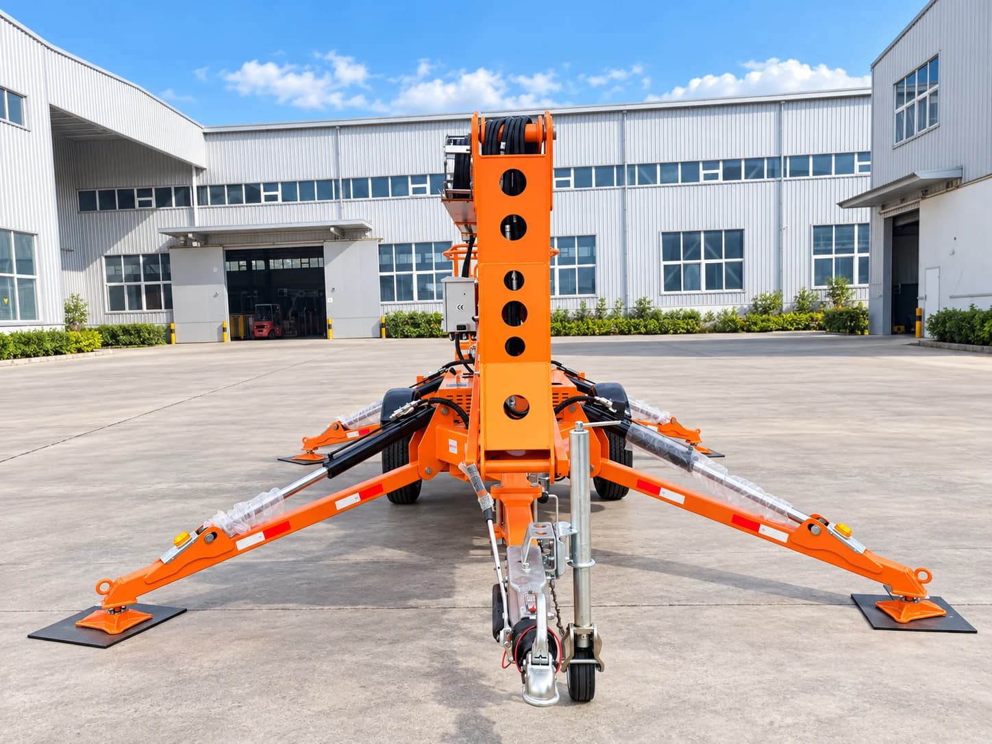 MCM TCP14 Cherry Picker / Trailer-Mounted Towable Boom Lift, front view of the tow hitch with outriggers spread