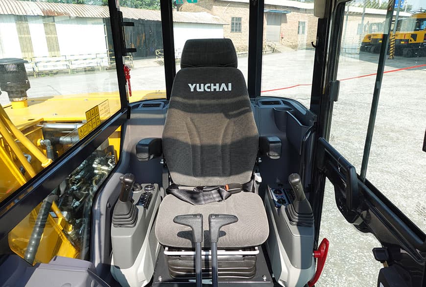 Yuchai YC80 excavator operator seat and joystick controls