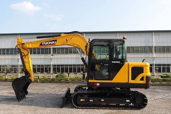 Yuchai YC80 8-ton excavator side view with bucket and dozer blade