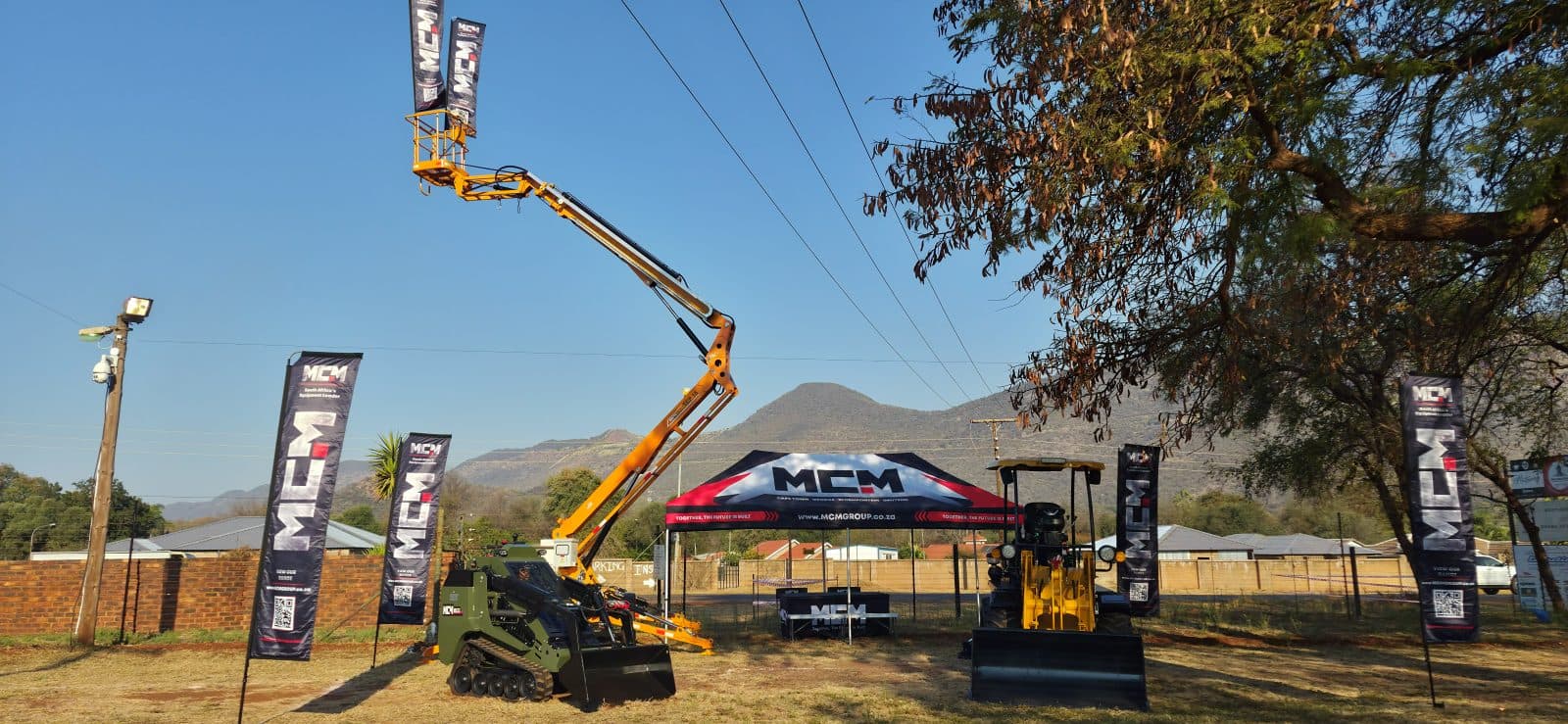 MCM Gauteng stand at the 2026 Thabazimbi Expo with the TCP cherry picker, MS33 mini track skidsteer and 27X Jack Russell TLB