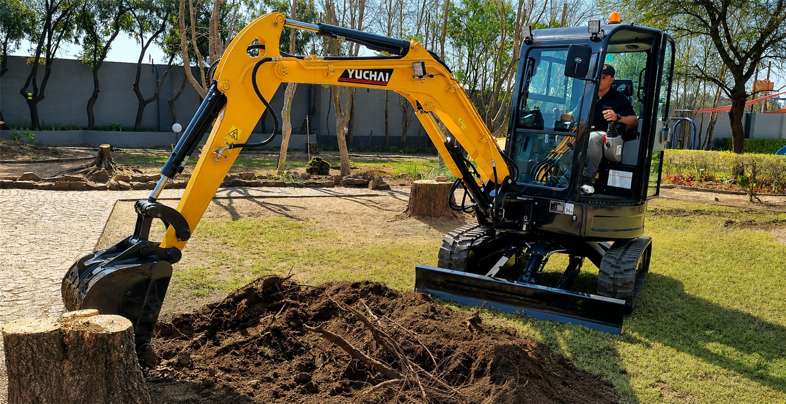 Yuchai U35 mini excavator digging on a landscaped site